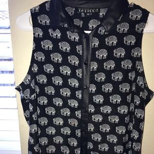 Black and white sleeveless button-up